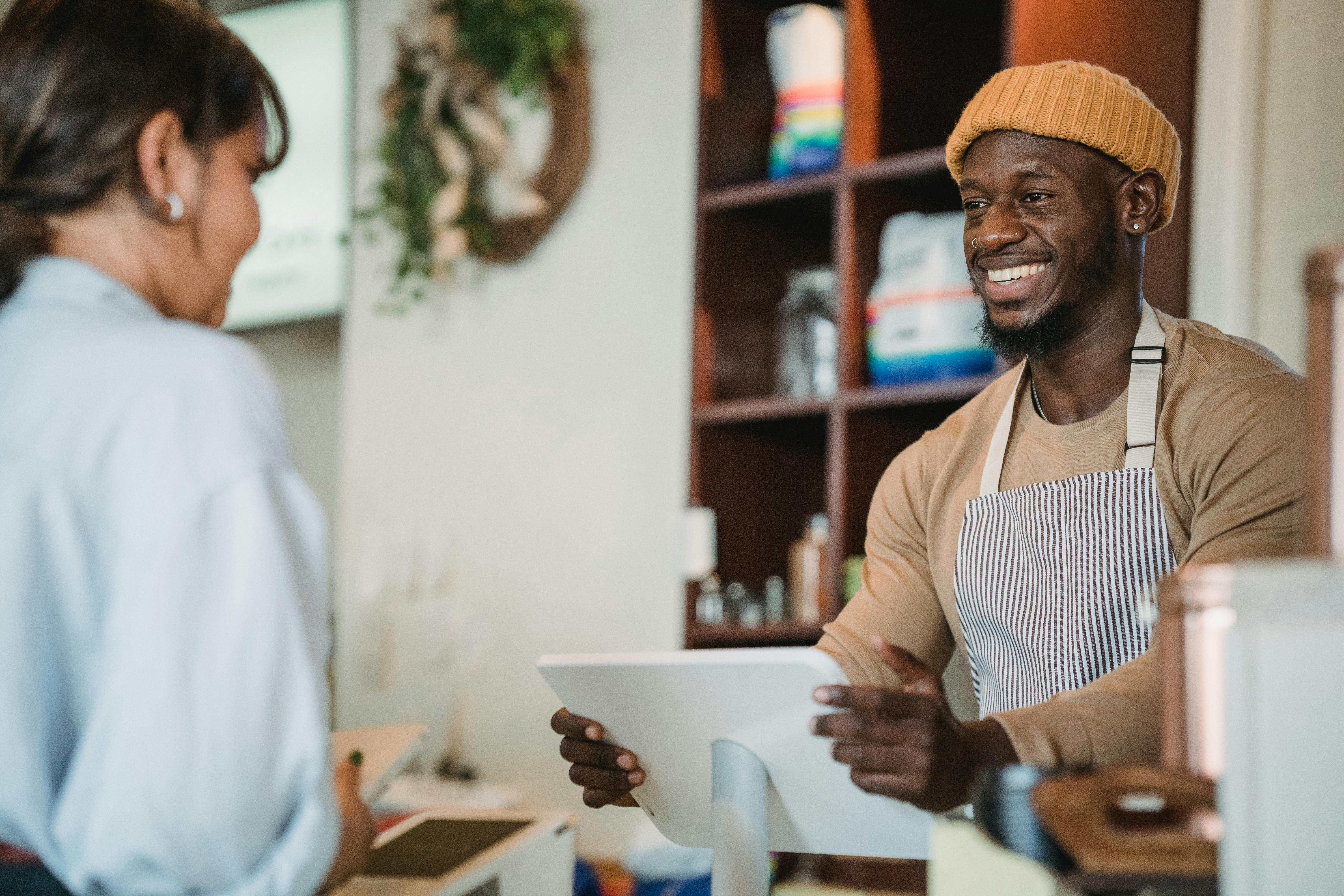 Barista serving a customer